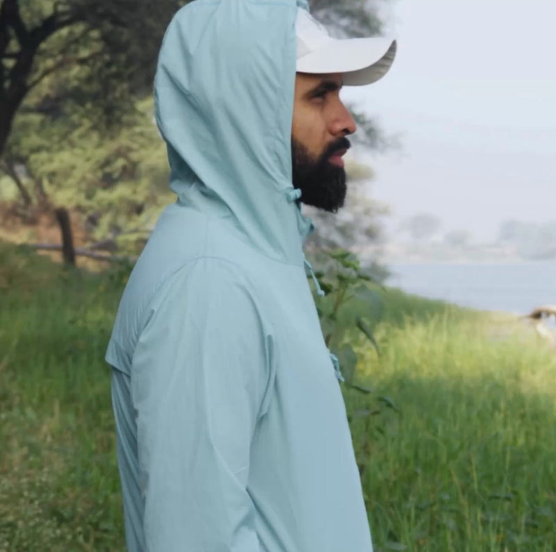 Why a Windbreaker Is the Layer That Saves You at Altitude (and How to Layer It)